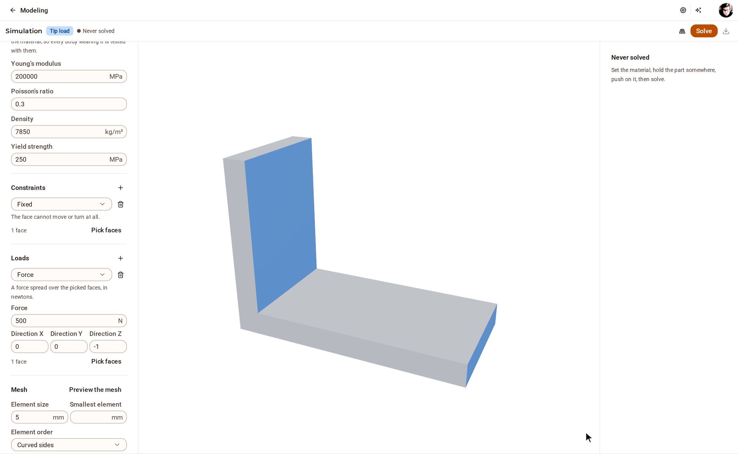 Under Loads, click + and choose Force, click the tip of the arm, then Done. Type the force in its Force field — here 500 N — and press Enter; it points down unless you change its Direction.